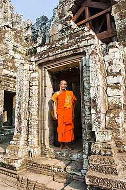 Buddhist monk at Bayon Temple, Angkor Temples, UNESCO World Heritage Site, Siem Reap, Cambodia, Indochina, Southeast Asia, Asia