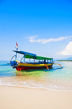 Traditional colourful Indonesian boat on the tropical island of Gili Meno, Gili Islands, Indonesia, Southeast Asia, Asia