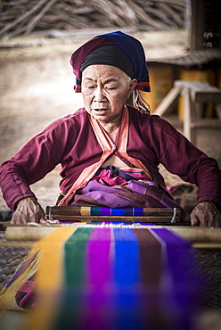 Palaung woman weaving, part of the Palau Hill Tribe near Hsipaw Township, Shan State, Myanmar (Burma), Asia