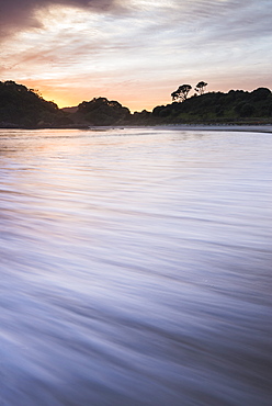 Sunrise at Maitai Bay (Matai Bay), a popular beach on the Karikari Peninsula, Northland, New Zealand, Pacific