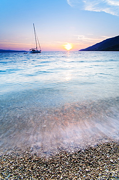 Adriatic Sea off Zlatni Rat Beach at sunset, Bol, Brac Island, Dalmatian Coast, Croatia, Europe 