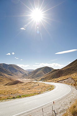 Long winding road through a valley, Otago, South Island, New Zealand, Pacific 