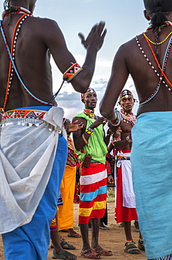 Portrait of Samburu tribe members dancing the traditional wedding dance at dusk, Kenya, East Africa, Africa