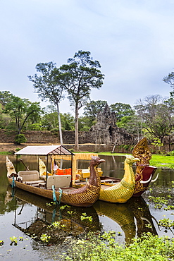 Ornate tourist boats near the South Gate at Angkor Thom, Angkor, UNESCO World Heritage Site, Siem Reap Province, Cambodia, Indochina, Southeast Asia, Asia