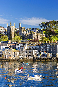 Early morning light on small boats at anchor in the harbour at Fowey, Cornwall, England, United Kingdom, Europe