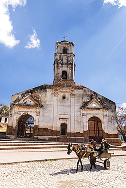 A horse-drawn cart known locally as a coche, Trinidad, UNESCO World Heritage Site, Cuba, West Indies, Caribbean, Central America