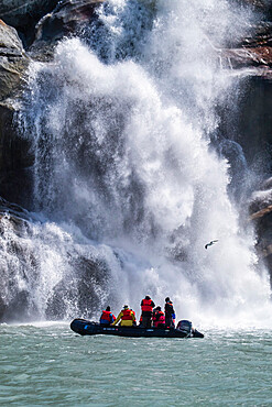 Lindblad National Geographic guests enjoy a Zodiac tour at Dawes Glacier, Southeast Alaska, United States of America, North America