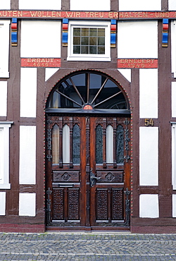 Entrance to a half-timbered house in Langenstrasse in Wiedenbrueck, Rheda-Wiedenbrueck, North Rhine-Westphalia, Germany