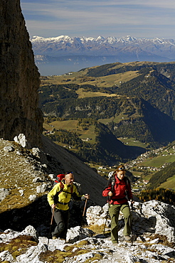 Hikers with hiking poles in the mountains, Dolomites, South Tyrol, Italy, Europe