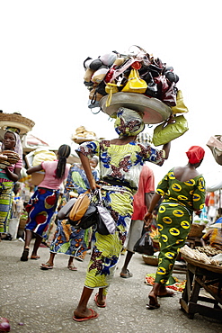 Woman selling handbags at Dantokpa market, Cotonou, Littoral Department, Benin