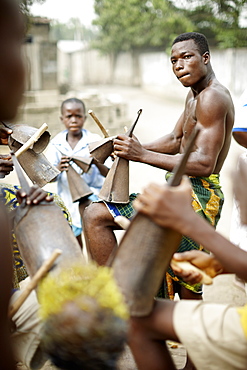 Men and boys playing percussions, Voudoun ceremony, Agbanakin, Togo