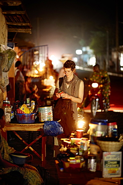 Woman at a night market, Ouidah, Atlantique Department, Benin