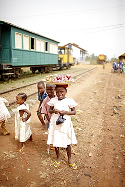 Children beside railroad tracks, between Ouidah and Cotonou, Benin