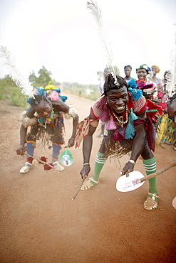 Togolese family dancing and celebrating on street, Taneka-Beri, Benin