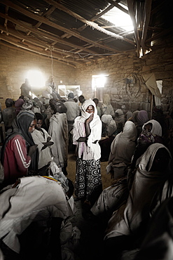 Young women waiting inside a grain mill, Feraywi, Gheralta Area, Tigray Region, Ethiopia