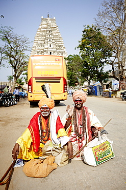 Street magicians, Virupaksha Temple in background, Hampi, Karnataka, India