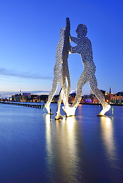 Illuminated artwork Molecule Man above the river Spree, artist Jonathan Borofsky, Berlin, Germany