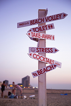 Cheeky signpost near the beach bar, Ostend, Flanders, Flemish Region, Belgium