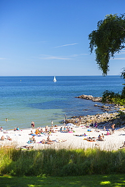 People on the beach sunbathing, Sandkas beach, Summer, Baltic sea, Bornholm, south of Sandvig and Allinge, east coast, Denmark, Europe