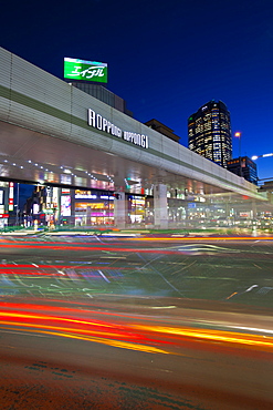 Long exposure of Roppongi Crossing at night, Minato-ku, Tokyo, Japan