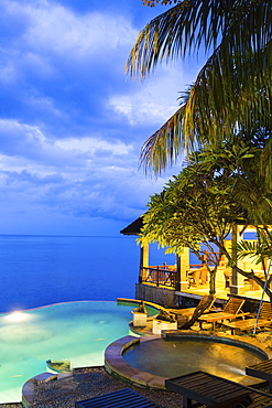 Hotel complex with pool in the evening, Amed, Bali, Indonesia