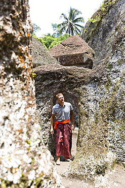 Man visiting Pura Gunung Kawi, Tampaksiring, Ubud, Bali, Indonesia