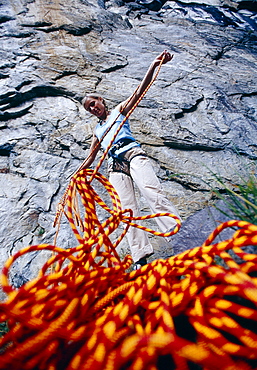 View at woman with climbing rope, Ticino, Switzerland, Europe