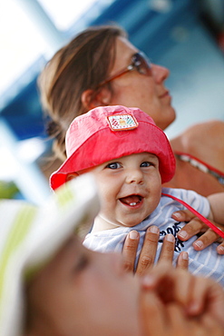 Baby with mother and sister, Formentera, Balearic Islands, Spain