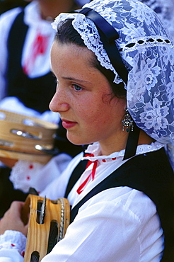 Girl wearing traditional dress, village festival,San Juan de Poio,Province Pontevedra,Galicia,Spain