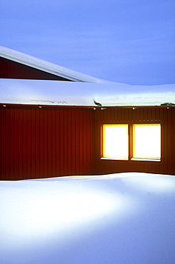 Snow covered hotel in the evening, Arjeplog Municipality, Lappland, Sweden