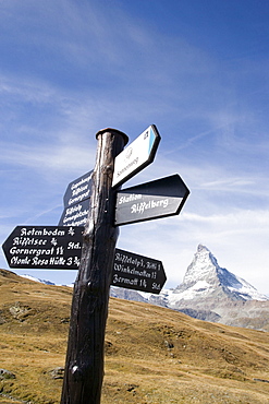 Signpost at hiking trail, Matterhorn (4478 metres) in background, Zermatt, Valais, Switzerland