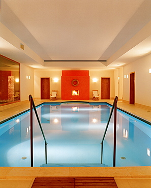 Open fire place at the pool, Badescheune, spa area of Seehotel Neuklostersee, Mecklenburg - Western Pomerania, Germany