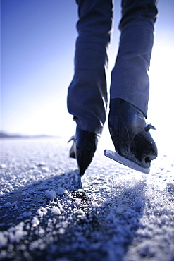 Young woman ice skating