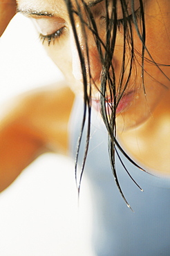 Young woman with wet hairs