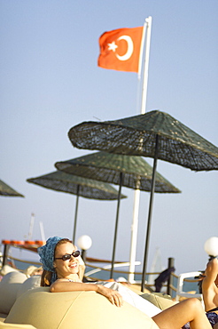 Smiling woman at beach, Turkey