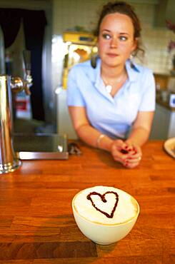 Waitress with a cup of coffee, Terrasen, Djuergarden, Stockholm, Sweden