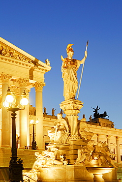 Pallas-Athena fountain in front of parliament in the evening, Vienna, Austria