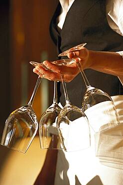 Waitress with wineglasses, Restaurant