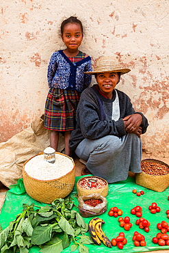 Woman offers vegetables for sale, Sendrisoa, Ambalavao Region, Central Highlands, Madagascar, Africa