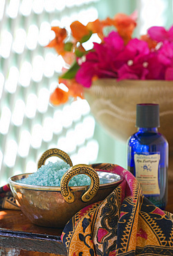 Detail shot Spa treatment products, salts, oils and flowers. St. Lucia, West Indies.