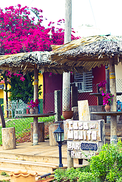 Terrace and wooden sign board of Casa del Mojito Bar in Viñales, Cuba