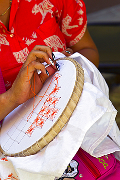 Detail of a woman who embroiders in Trinidad, Cuba