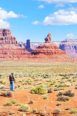 Man contemplating landscape, Valley of the Gods, Utah, USA