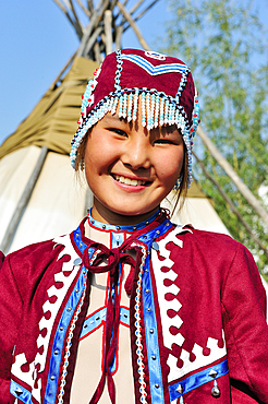 Young people in traditional costumes for tourist presentations. Shigansk is a settlement on the lower reaches of the Lena, where it crosses the Arctic Circle on its way to the Arctic Ocean. It was founded in 1632. The population lives mainly from fur hunt