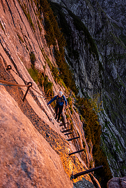 Mountaineers on the way through Höllental to the Zugspitze - Höllental via ferrata in sunrise