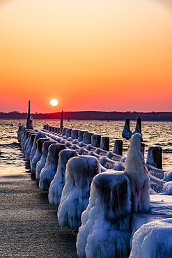 Icy old wooden pier on the beach, Travemünde, Bay of Lübeck, Schleswig Holstein, Germany