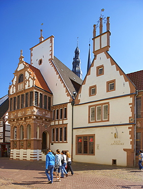 Corner Mittelstrasse, Markt (market place) with pharmacy and spires of St Nicolai church in the town of Lemgo, Strasse der Weserrenaissance, Lippe, North Rhine-Westphalia, Germany, Europe