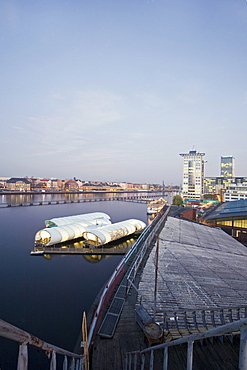 Badeschiff, floating swimming pool. In the foreground a former East German border patrol walkway