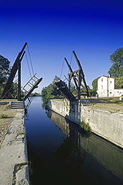 Bascule bridge above a river under blue sky, Bouches-du-Rhone, Provence, France, Europe