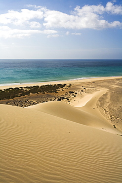 Dune on the waterfront in the sunlight, Playa de Satovento de Jandia, Parque Natural de Jandia, Jandia peninsula, Fuerteventura, Canary Islands, Spain, Europe